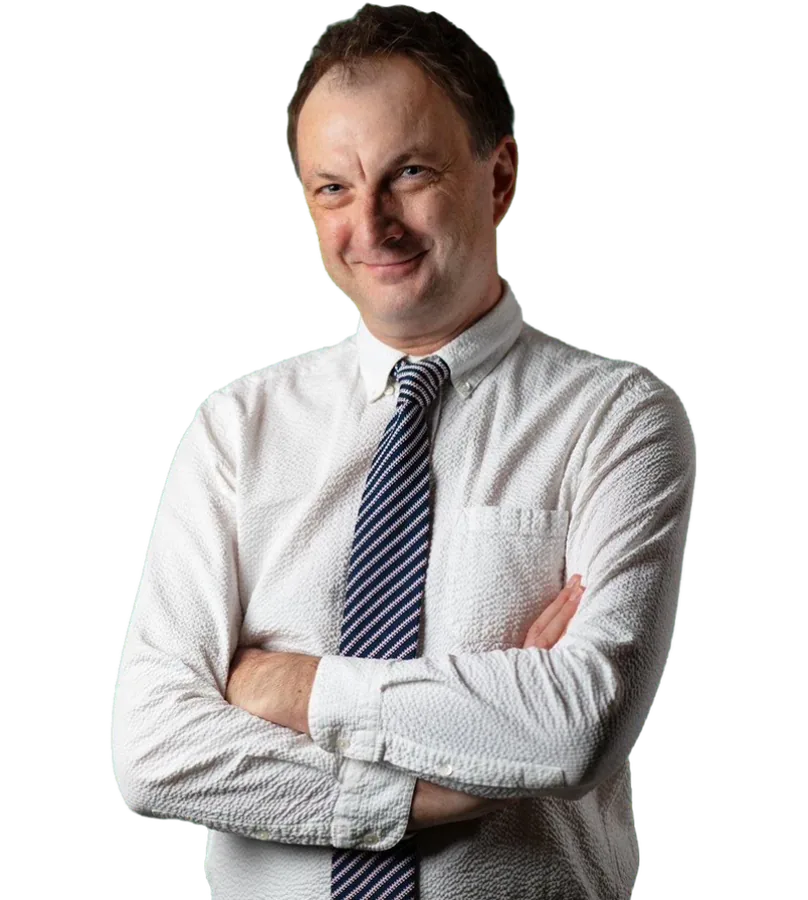 Marcin Borkowski — service designer and change manager, arms folded
